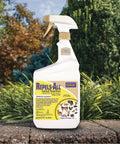 Repels All Animal Repellent Ready To Use Spray 32 Oz bottle in garden setting with green shrubbery background