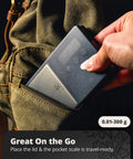 Person placing Ultra Precise Pocket Scale With 300 Gram Capacity And 0.01 Gram Increments in a backpack pocket