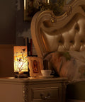 Birds In A Tree Wood Table Lamp With Wood Lampshade And Bronze Metal Base on bedside table, cozy vintage night light.