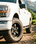 Trail Blade MTS Mud Terrain Radial Tire For Light Trucks And Jeeps, 35X13.50R24LT displayed on a white truck off-road