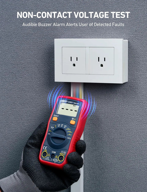 Gloved hand using All In One Digital Multimeter For DIYers to test voltage near a wall outlet with NCV safe tester indicator.