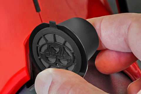 Inserting black refillable coffee pod for OriginalLine machines pack of 6 into red Nespresso compatible device