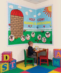 Classroom bulletin board with Azure Scalloped Decorative Border Roll, 2.25 X 50 Feet, showcasing farm-themed design with a child reading.