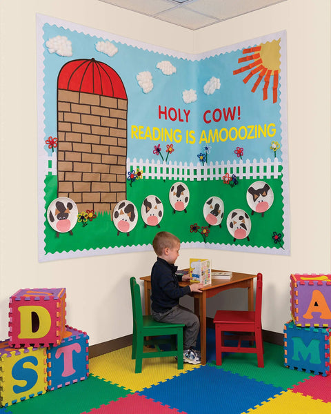 Classroom bulletin board with Azure Scalloped Decorative Border Roll, 2.25 X 50 Feet, showcasing farm-themed design with a child reading.