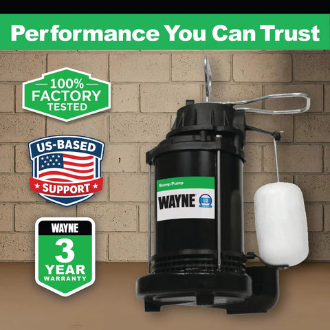 One Third HP Submersible Sump Pump With Cast Iron And Stainless Steel Housing, shown against brick wall, warranty badges visible