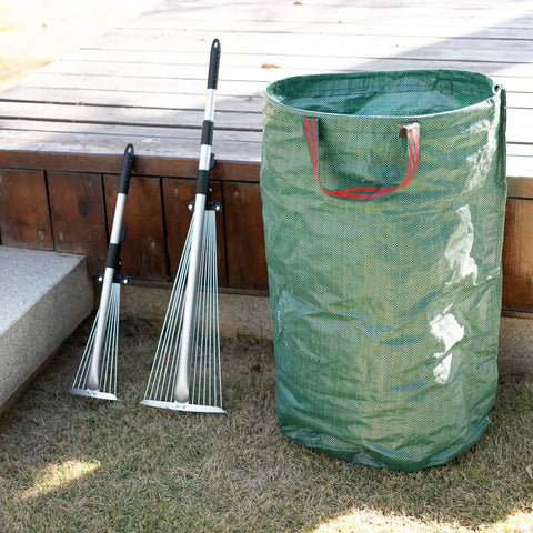 Two Pack Adjustable Yard Rake Set with 63-inch 15-tine big rake and 30-inch 9-tine small rake next to green garden bag