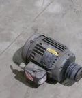 Three Phase Industrial Electric Motor 1740 RPM 60Hz 208 To 230V And 460V, Beefed Up Heavy Duty Used Good Condition, on concrete floor