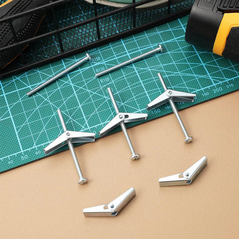 Set of toggle bolts from 20 Piece Wing Nut And Bolt Kit With Toggle Bolts For Drywall And Heavy Duty Fastening on cutting mat