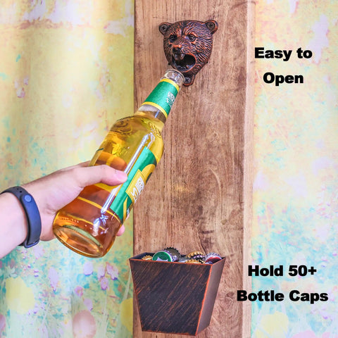 Heavy Duty Cast Iron Bear Head Wall Mounted Bottle Opener With Nifty Little Cap Catcher Antique Copper Finish in use with bottle.