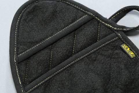 Black X Pad Suppressor Handler for Tactical Duty Gear with CarbonX heat resistance, heavyweight felt, and Kevlar stitching detail