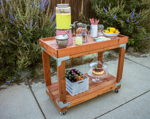 Outdoor wooden rolling cart with drinks and desserts, featuring Workbench And Shelving Hardware Kit With RTC2Z Corner Connectors And Wafer Head Screws.