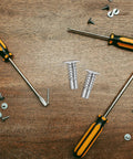 Built Tough Sofa Headrest Adjustment Hinge Screws 4 Pack with tools and screws on a wooden surface for furniture repair.