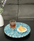 Lazy Susan Turntable Organizer With Mother Of Pearl Inlay, Wood Round Spinning Tray on table with glass and roll