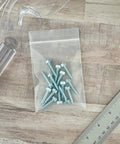 3x4 Inch Clear Zipper Reclosable Bags, 6 Mil Heavy Duty Storage Bags Pack Of 100, FDA Food Safe Transparent LDPE For Organization And Food Prep For Grab And Go Kitchen Or Office Storage holding screws on desk