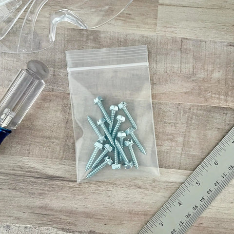 3x4 Inch Clear Zipper Reclosable Bags, 6 Mil Heavy Duty Storage Bags Pack Of 100, FDA Food Safe Transparent LDPE For Organization And Food Prep For Grab And Go Kitchen Or Office Storage holding screws on desk