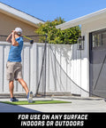 Golfer using Shank Net Attachment For Golf Hitting Nets Catches Errant Shots Left Or Right Handed And Fits 10x7 And 7x7 Foot Nets