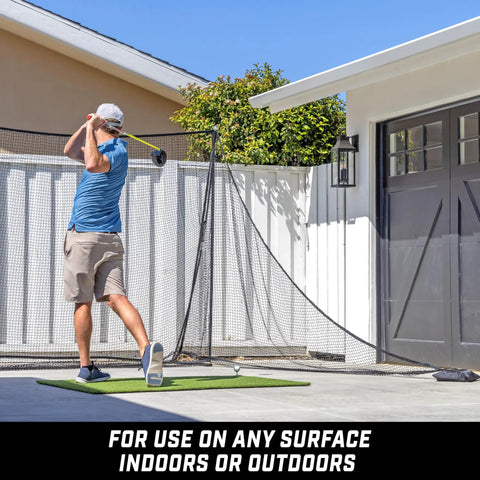 Golfer using Shank Net Attachment For Golf Hitting Nets Catches Errant Shots Left Or Right Handed And Fits 10x7 And 7x7 Foot Nets