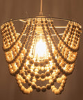Wood Beaded Plug In Chandelier Lighting 1 Light Beaded Chandelier Boho Ceiling Fixture glowing with warm light
