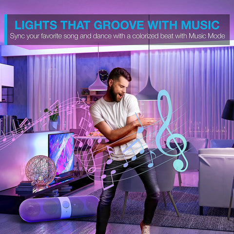 Man dancing in living room with Smart LED Strip Lights 16.4 Ft with Alexa and Google Control, music sync feature highlighted