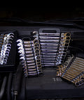 Flex Head Ratcheting Wrench Set 12 Piece Metric Six Point Box End With 120 Tooth Precision Gear arranged on car engine