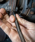 Using Hammerless Three Piece Tool Set With Center Punch Prick Punch Cold Chisel Hammer And Hinge Pin Remover on metal