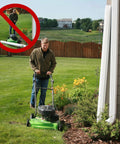 Man mowing lawn with Flip Up Downspout Hinge Kit For Easy Yard Access No Detach Needed Perfect For Lawn Mowing Fits 2x3 And 3x4 Downspouts And 5In Or 6In Gutters DIY Install 6 Pack Made In USA.