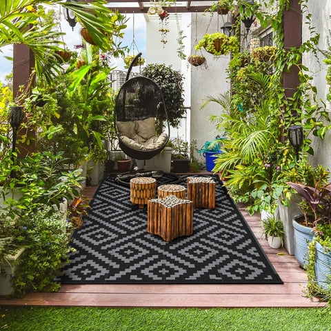 Durable 5x8 Outdoor Rug For Patio And RV Use, Waterproof Reversible Plastic Mat with geometric design, porch setting