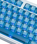 Close-up of Built Damn Tough Full Aluminum Wireless Mechanical Keyboard With Hot Swappable Switches and Smart Tri Mode Pairing Featuring Custom Rgb Lighting 8000Mah Cell For Elite Gaming And Typing Setups, illuminated keys.