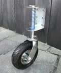 8 Inch Pneumatic Spring-Loaded Gate Caster Wheel, 360 Degree Swivel, Heavy-Duty Universal Mount attached to gate