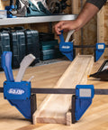 Gnarly Quick Grip Bar Clamps 12 Inch Heavy Duty Woodworking Tool 300 Lb Capacity GripMaxx Tech in use on wood panel.