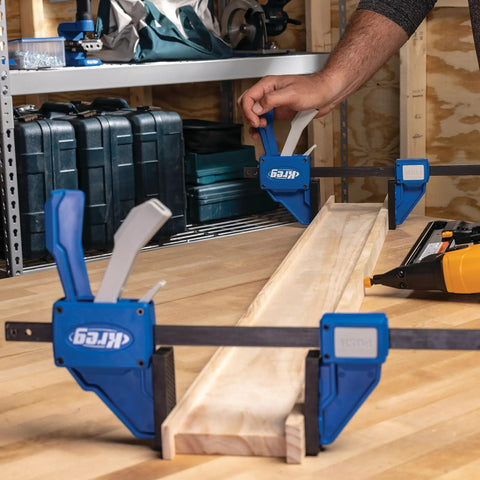 Gnarly Quick Grip Bar Clamps 12 Inch Heavy Duty Woodworking Tool 300 Lb Capacity GripMaxx Tech in use on wood panel.