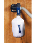 Portable 1 HP Dust Collector For Small Shops No Nonsense With 2 Micron Cloth Bag 660 CFM Performance 4 Inch Dust Port Versatile Woodworking Dust System For Quick Cleanup In Garages And Hobby Shops mounted on wall in garage.