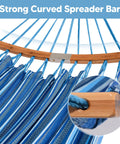 Close-up of blue double hammock with curved wooden spreader bar and thick ropes for Double Hammock With Curved Spreader Bar For Outdoor Hangouts In Patio Backyard Balcony Portable With Carrying Bag And Tree Straps Supports Up To 450lbs Blue Ideal For Indoor Bedroom Or Outdoor Patio Lounging And Travel Ready
