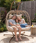 Double Hanging Egg Chair With Stand For Patio Or Balcony Oversized Two Person Outdoor Swing With Thick Cushions And All Weather Wicker Loveseat Beige Great For Outdoor Lounging And Socializing