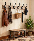Six Pack Cast Iron Wall Hooks Vintage Black Metal Heavy Duty Coat Rack Bathroom Kitchen Entryway Decor Includes Fastening Hardware And Anchors in use displaying jackets and accessories.
