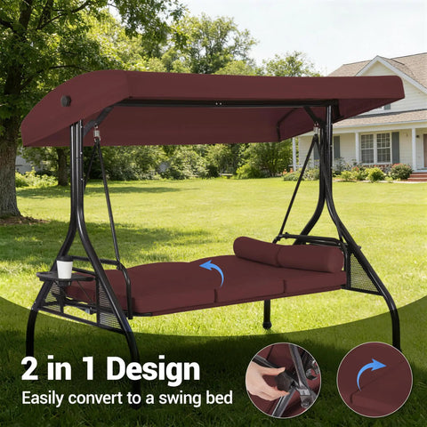 Three Seat Outdoor Porch Swing With Adjustable Canopy And Convertible Bed Two In One Patio Glider, Burgundy Red in garden setting