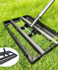 Tough As Nails Heavy Duty Lawn Leveling Rake With 74 Inch Adjustable Handle, reinforced welds, shown on grass, close-up view