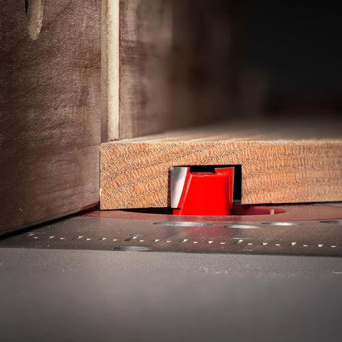 Undersized Plywood Router Bit Set, Three-Piece, 1/4 Inch Shank, showing true thickness bit cutting plywood joint