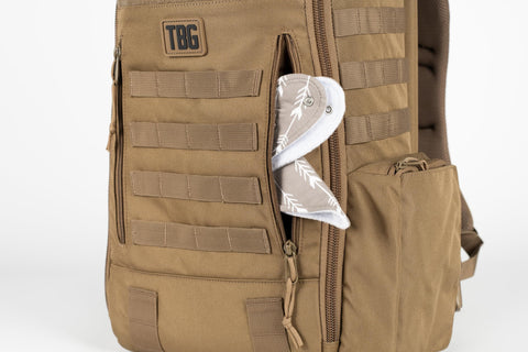 MOLLE Compatible Diaper Backpack for Dads With Built-In Changing Mat And Stroller Straps, Rugged 600D Tactical Daypack in Coyote Brown, side view with visible MOLLE webbing.