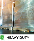 Industrial Heavy Duty Shrink Wrap Stretch Film Roll 18x4265 Foot 120 Gauge Super Tough Plastic Sheet securing pallets in warehouse.