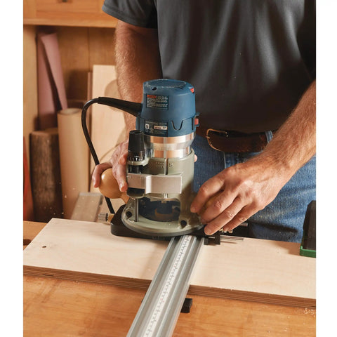 Top Shelf Router Dado Jig With CNC Machined Aluminum Carriage And One Inch Precision Bushing in use on woodworking bench.