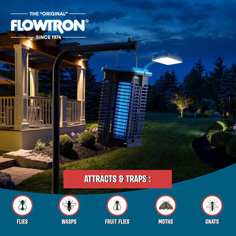 Two In One Solar Powered Bug Zapper With UV Light And LED Lamp installed in garden at night, illuminating patio area