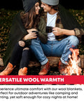 Couple wrapped in Hardcore Wool Blanket For Outdoors And Survival by a campfire, enjoying warmth, olive drab green color.