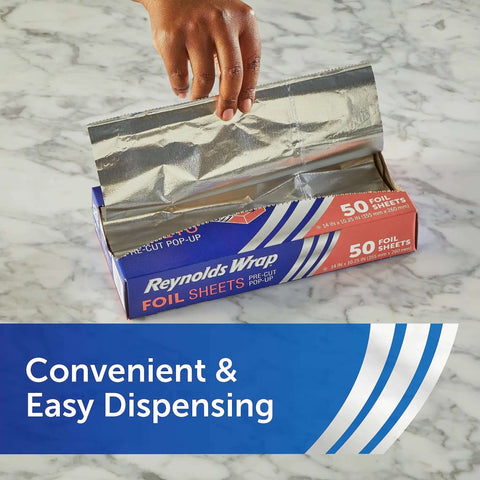 Hand pulling sheet from Reynolds Wrap box, No Fuss Pre Cut Pop Up Aluminum Foil Sheets 14 By 10.25 Inches Each Pack Of 5 50 Sheets Per Box.