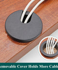 Black Desk Cable Grommets 1.5 Inch Plastic Hole Covers for Office Equipment installed in wooden desk with cables