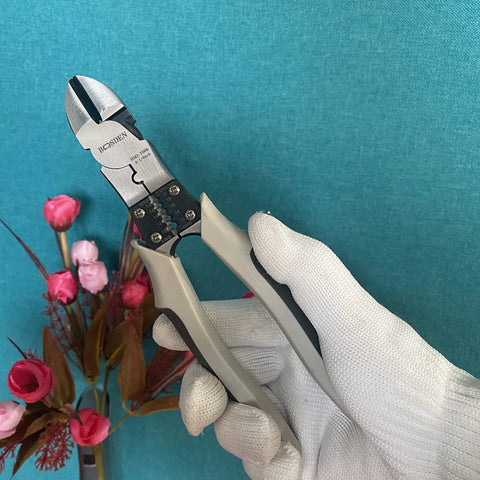 Heavy Duty Wire Cutters With Wire Stripper And Crimping Pliers 8 Inch Diagonal Cutters held against a floral backdrop