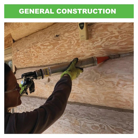 Worker using 30 Oz Bulk Caulking Gun With 12 To 1 Drive, Beefy Steel Barrel, Swivel Handle for sealing wood logs.