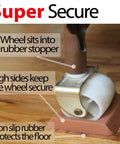 Close-up of Universal Bed Wheel Stopper Set Six Pack For Furniture Casters showing rubber cup securing a caster on hardwood floor.