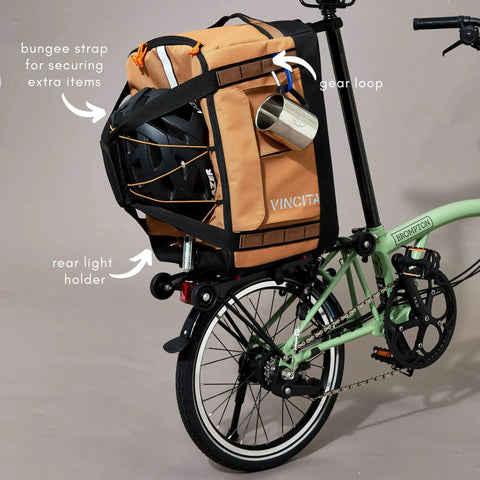 Road Ready Three In One Rear Rack Bag That Transforms From Backpack To Duffle To Pannier 37L Capacity mounted on folding bike