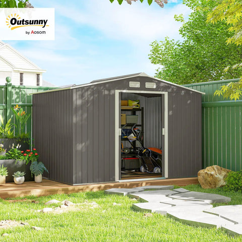 9x6 Outdoor Metal Storage Shed With Foundation Kit, Double Lockable Doors, Air Vents, Sloping Roof, in a green backyard